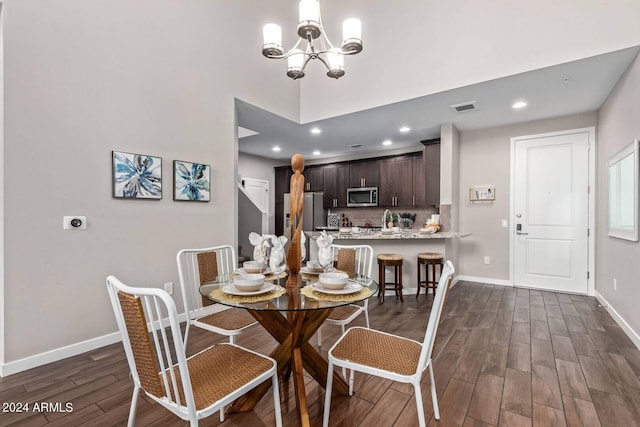 2511 W Queen Creek Rd Unit 425, Chandler, AZ 85248 - dining area featuring recessed lighting, an inviting chandelier, dark wood-type flooring, baseboards, and visible vents