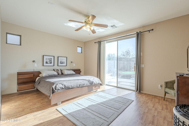 bedroom featuring access to exterior, light wood-type flooring, visible vents, and ceiling fan