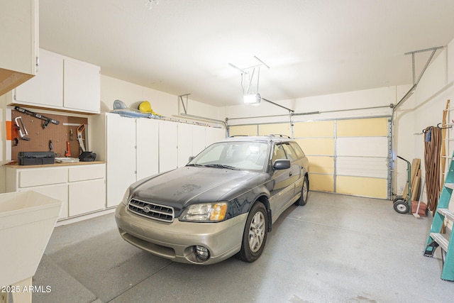 garage featuring a garage door opener