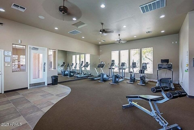 exercise room featuring visible vents and a healthy amount of sunlight