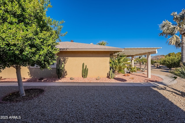 exterior space with a pergola