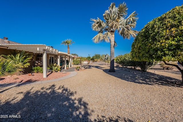 view of yard with a pergola