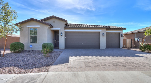 view of front of property with a garage