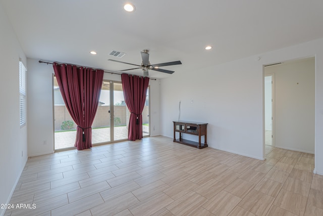 spare room with ceiling fan