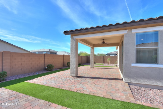 view of patio with ceiling fan