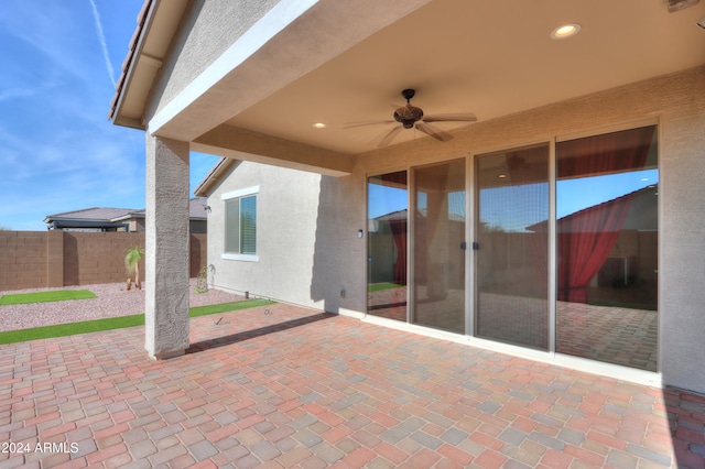 view of patio / terrace featuring ceiling fan