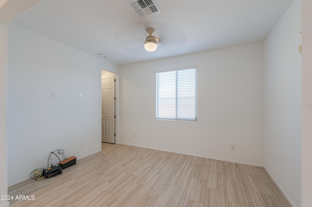 unfurnished room with light hardwood / wood-style floors and ceiling fan