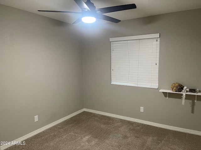 unfurnished room with carpet flooring and ceiling fan