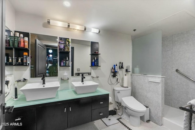 bathroom featuring tile patterned floors, vanity, toilet, and walk in shower