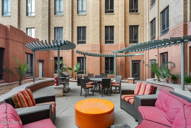 view of patio featuring a pergola and outdoor lounge area