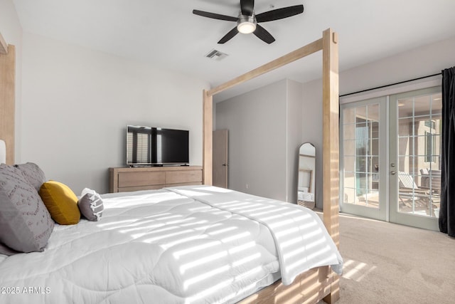 carpeted bedroom with access to exterior, french doors, and ceiling fan