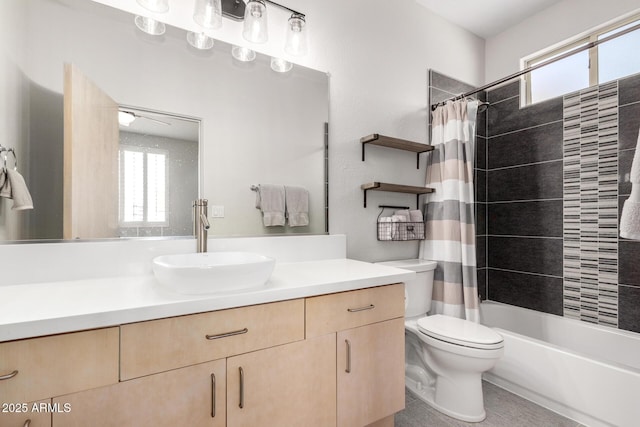 full bathroom with vanity, a healthy amount of sunlight, toilet, and shower / bath combination with curtain