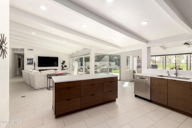 kitchen with modern cabinets, light countertops, and dishwasher