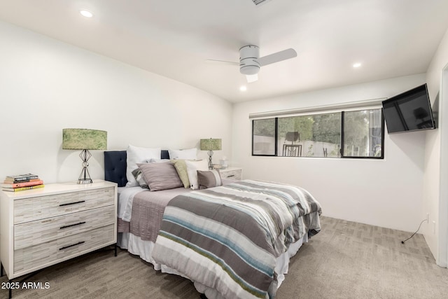 carpeted bedroom with ceiling fan and recessed lighting