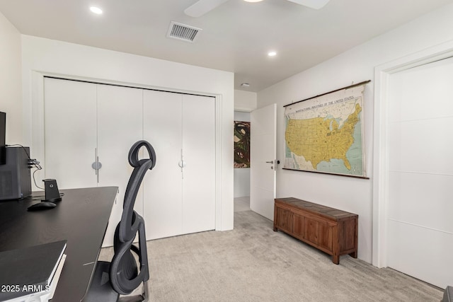 office featuring light colored carpet, visible vents, ceiling fan, and recessed lighting