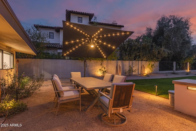 view of patio / terrace with a fenced backyard and outdoor dining area