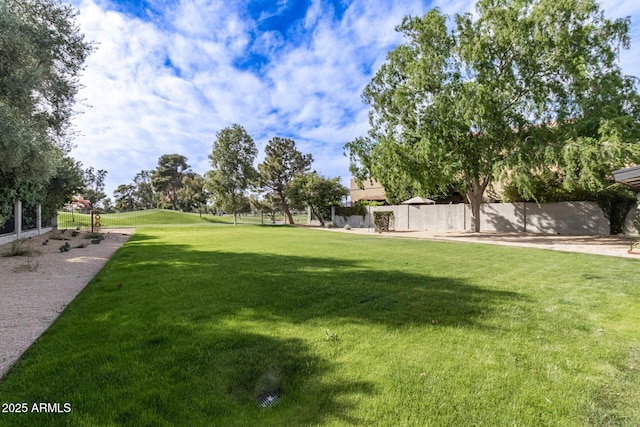 view of yard featuring fence