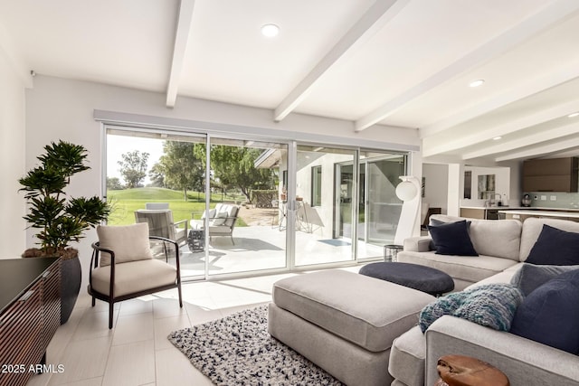 living room featuring light tile patterned flooring, beam ceiling, and recessed lighting