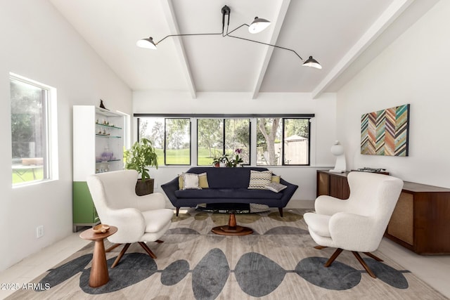 living room featuring lofted ceiling with beams