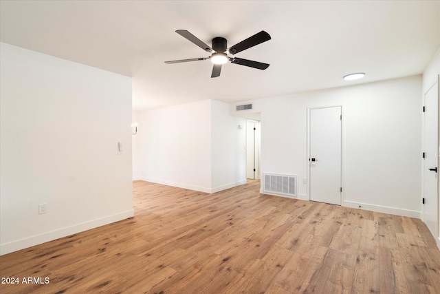 unfurnished room featuring light hardwood / wood-style floors and ceiling fan