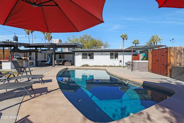 view of swimming pool featuring a patio