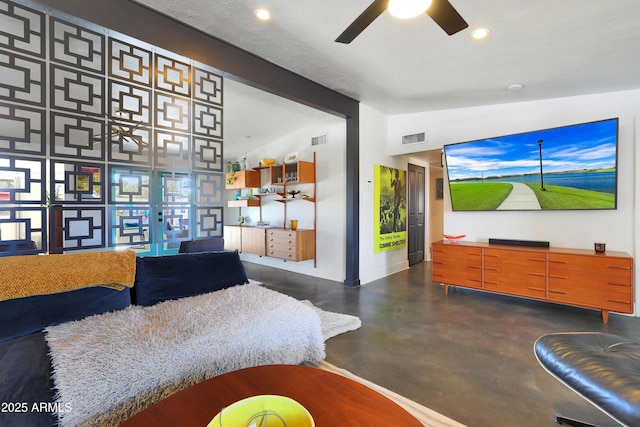 living room with ceiling fan and vaulted ceiling with beams