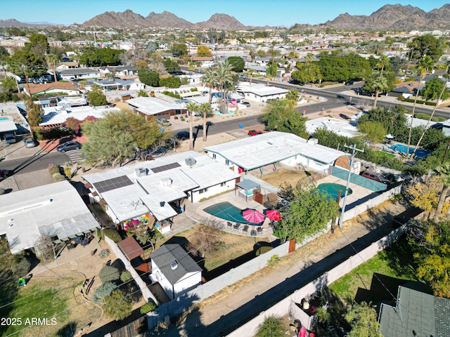 birds eye view of property featuring a mountain view