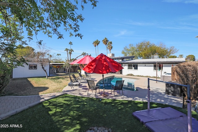 view of yard with a patio area and an outdoor structure