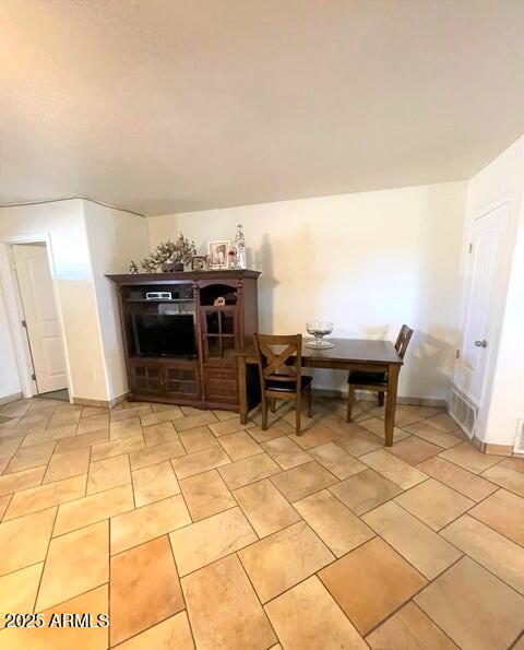 view of tiled dining area