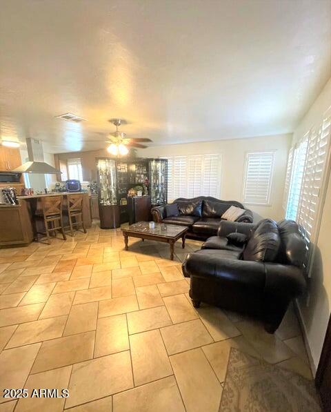 living room with ceiling fan