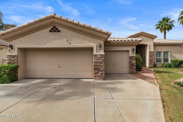 2128 E Clipper Ln, Gilbert, AZ 85234 - view of front of property with an attached garage, concrete driveway, and stone siding