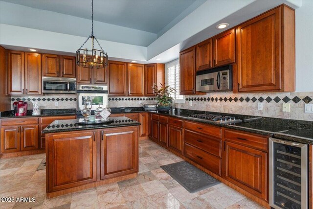 2128 E Clipper Ln, Gilbert, AZ 85234 - kitchen with wine cooler, appliances with stainless steel finishes, tasteful backsplash, pendant lighting, and recessed lighting