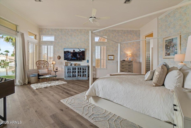 2128 E Clipper Ln, Gilbert, AZ 85234 - bedroom featuring wallpapered walls, ornamental molding, multiple windows, and wood finished floors