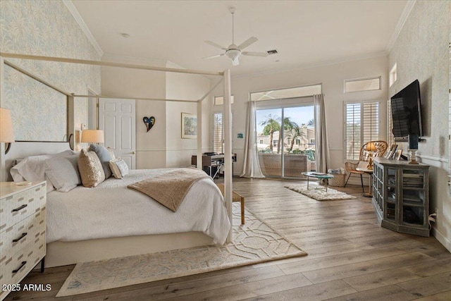 2128 E Clipper Ln, Gilbert, AZ 85234 - bedroom featuring access to exterior, wood finished floors, crown molding, and a towering ceiling
