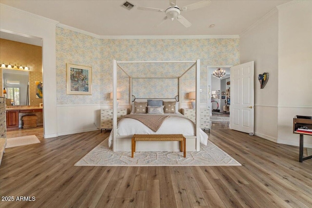 2128 E Clipper Ln, Gilbert, AZ 85234 - bedroom featuring wallpapered walls, wood finished floors, ornamental molding, baseboards, and wainscoting