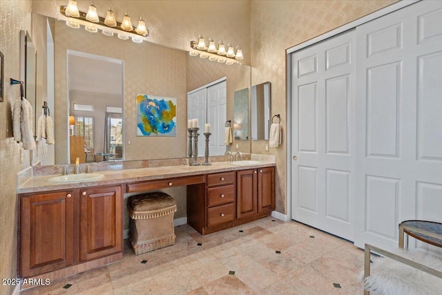 2128 E Clipper Ln, Gilbert, AZ 85234 - bathroom featuring double vanity and a textured wall