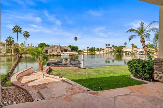 2128 E Clipper Ln, Gilbert, AZ 85234 - view of grassy yard with a water view, a residential view, and a boat dock