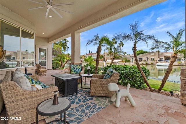 2128 E Clipper Ln, Gilbert, AZ 85234 - view of patio / terrace featuring a ceiling fan, a water view, and an outdoor hangout area