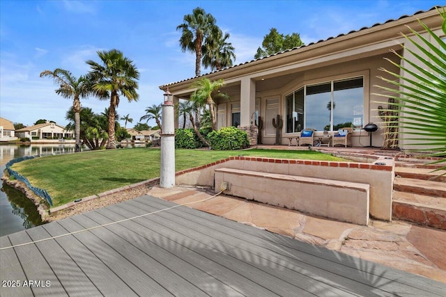 2128 E Clipper Ln, Gilbert, AZ 85234 - deck featuring a yard and a water view