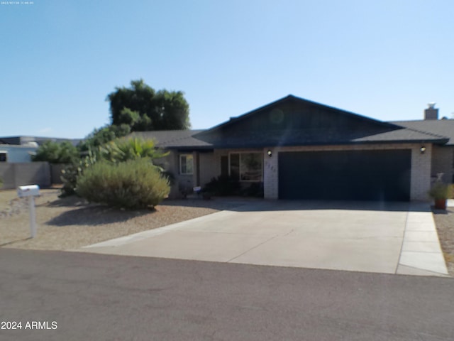 ranch-style home with a garage