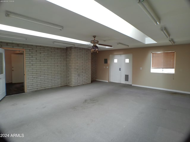 garage with ceiling fan