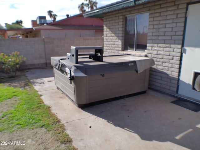 view of patio featuring a hot tub