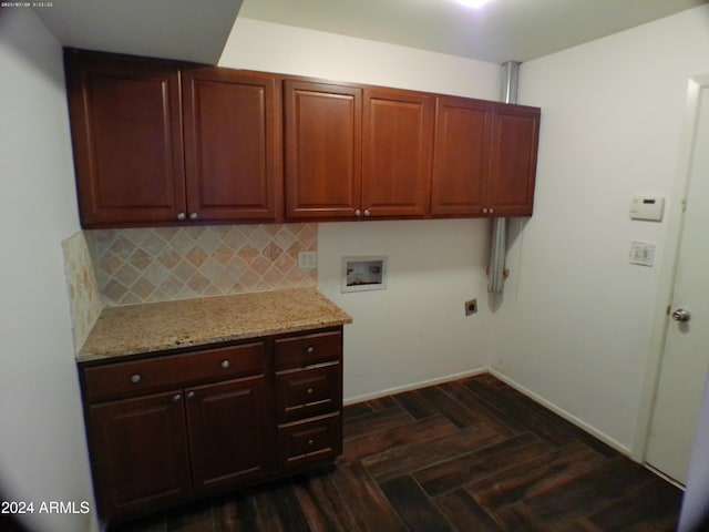 laundry room with washer hookup, hookup for an electric dryer, and cabinets