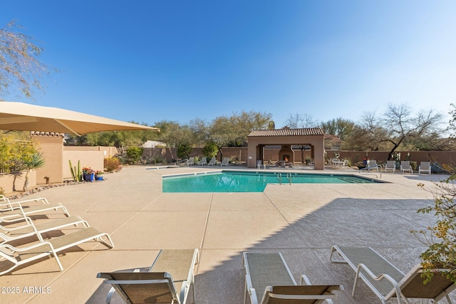 view of pool featuring a gazebo and a patio area