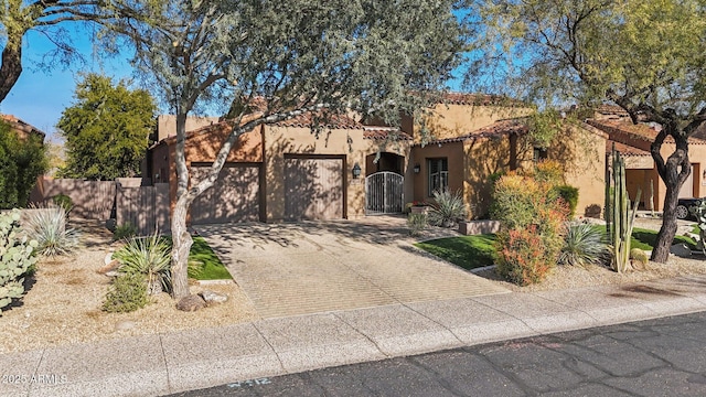 view of front of property featuring a garage