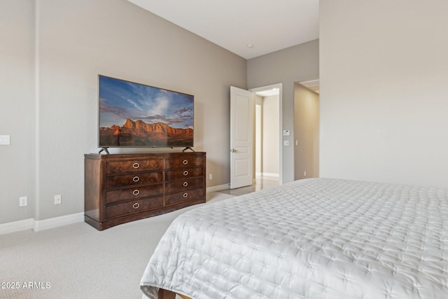 bedroom with light colored carpet