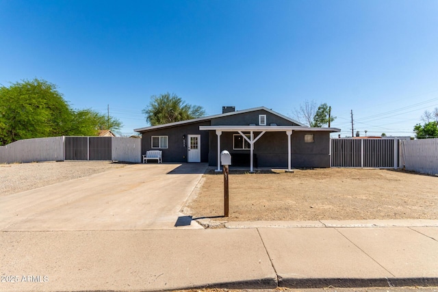511 E Purdue Ave, Phoenix, AZ 85020 - view of front of property featuring driveway and stucco siding