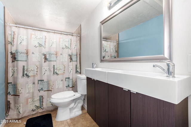 511 E Purdue Ave, Phoenix, AZ 85020 - full bathroom featuring toilet, tile patterned floors, vanity, and a shower with shower curtain