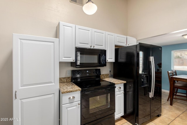511 E Purdue Ave, Phoenix, AZ 85020 - kitchen featuring black appliances, white cabinets, and light tile patterned floors
