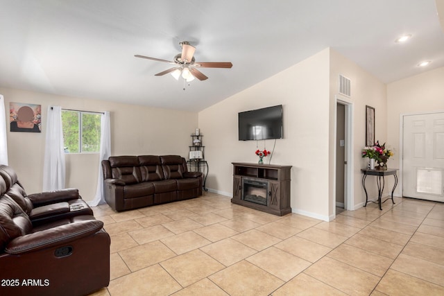 511 E Purdue Ave, Phoenix, AZ 85020 - living area featuring lofted ceiling, ceiling fan, light tile patterned floors, a glass covered fireplace, and recessed lighting
